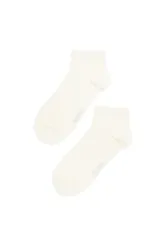 Par de medias deportivas cortas color blanco, con logo de la marca Pimentón estampado en el lateral.
