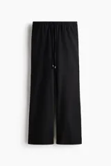 Pantalon negro de tiro bajo confeccionado en mezcla de lino y viscosa, con cintura elastizada, cordon de ajuste frontal con cuentas decorativas, piernas rectas y bolsillos laterales.