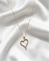 Collar de acero con baño de oro, compuesto por una cadena fina y un dije en forma de corazón calado decorado con pequeñas circonias multicolor.