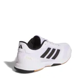 Championes deportivos Adidas Ligra 8 para interior, color blanco con las icónicas tres tiras laterales en negro. Presentan una estructura de malla transpirable con refuerzos sintéticos, cuello acolchado negro y suela de goma color caramelo diseñada para ofrecer tracción en superficies indoor.