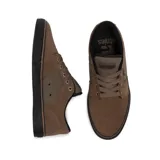 Championes Etnies modelo Barge LS de color negro, con diseño de perfil bajo, suela blanca y detalles en lona y gamuza.