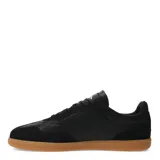 Championes negros de cuero sintético con detalles en gamuza y logo Umbro en blanco. Suela de goma color caramelo.