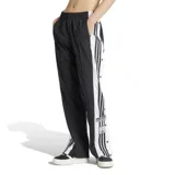 Pantalón Adidas modelo Adibreak, de color negro con paneles laterales blancos y las icónicas tres tiras de la marca. Cuenta con botones a presión en los laterales y corte holgado.