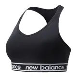 Top deportivo negro con espalda deportiva y banda elástica con logo New Balance.