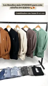 Canguro oversize color marrón terracota, tejido con capucha y cordones blancos.