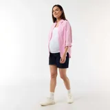Camiseta de tirantes blanca diseñada para lactancia, con breteles ajustables y broches de apertura rápida. Confeccionada en algodón suave, presenta un corte ajustado y cómodo.