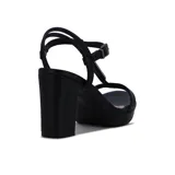 Sandalia negra de tacón alto con plataforma, tira delantera y pulsera al tobillo. La tira central está adornada con apliques brillantes.