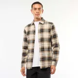 Camisa de manga larga con diseño de cuadros en tonos beige, negro y gris. Presenta cuello clásico, cierre frontal con botones y puños abotonados.