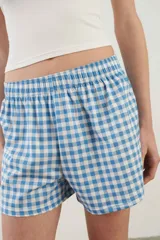 Short de pijama de algodón gris claro melange, con cintura elástica y diseño cómodo.