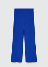 Pantalón de corte recto y tiro alto, confeccionado en tejido fluido con textura. Presenta cintura elástica para mayor comodidad.