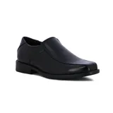 Zapato de vestir negro, sin cordones, de cuero sintético, con elástico en los laterales y suela de goma.