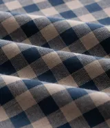 Pantalón de pijama de tricolina con estampado de cuadros, cintura elástica y corte recto.