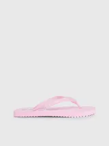 Ojotas de playa rosadas marca Calvin Klein Jeans, con logo estampado en la tira.