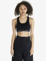 Top deportivo tipo racer back de color negro, confeccionado en tejido elástico con banda elástica inferior personalizada con el logo de la marca Carhartt.