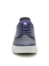 Championes Caterpillar modelo Hex Lite Leather, color azul con suela chunky blanca y detalles en negro. Confeccionados en cuero y material textil, con cordones y la marca grabada en el lateral.