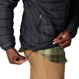 Campera puffer Columbia modelo Powder Lite II, color negro, con tecnología termorreflectiva Omni-Heat, cuello alto, cierre frontal y bolsillos laterales con cremallera.