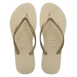 Chancletas Havaianas modelo Slim de color dorado, con suela de goma texturizada y tiras finas metálicas.