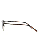 Lentes de sol RKF modelo Positano, con armazón estilo clubmaster de acetato con estampado carey y detalles metálicos dorados, y cristales polarizados color marrón.