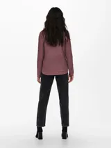 Sweater de punto con cuello redondo y manga larga, de corte regular y textura suave.