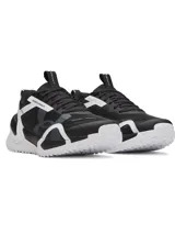 Championes de entrenamiento Under Armour modelo W Reign XT, diseñados para agilidad y estabilidad. Presentan una combinación de colores negro, blanco y gris, con entresuela de doble densidad y estructura superior de TPU para mayor contención.