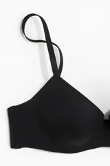 Soutien push-up de microfibra con copas acolchadas, aros y breteles ajustables.