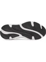 Championes de running Under Armour modelo Rogue 6, color negro con entresuela blanca. Confeccionados con malla transpirable y superposiciones de TPU para mayor soporte, cuentan con amortiguación Charged+ para una pisada suave y suela de goma duradera.
