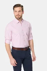 Camisa celeste a rayas verticales, de manga larga con opción de enrollar, corte slim fit, con bolsillo en el pecho y confeccionada en algodón.