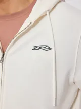 Canguro negro con capucha y cierre, con estampado en la espalda con el logo de Rusty Surfboards en rojo y blanco.