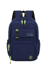 Mochila Trendy color azul marino con detalles en verde neón. Cuenta con múltiples compartimentos, cierres con tiradores de cuerda verde neón y un parche circular con la frase "YOU CAN DO IT" en la parte inferior.