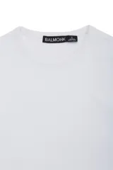 Camiseta básica de manga larga con diseño entallado y cuello redondo, confeccionada en tejido elástico.