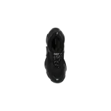Championes Balenciaga modelo Triple S, de diseño chunky en color negro con suela gruesa esculpida y el nombre de la marca bordado en el lateral.