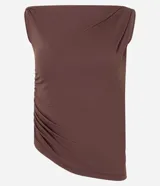Blusa de microfibra color amarillo claro, sin mangas, con escote de hombro único, detalle torcido en el hombro y fruncidos en todo el diseño. Presenta un corte ajustado y bajo asimétrico.