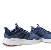 Championes Adidas AlfaEdge de running, color azul con detalles en azul marino y suela blanca. Presentan el logo de las tres tiras en los laterales, cierre con cordones y mediasuela Bounce para mayor amortiguación.