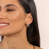 Aros de plata 925 con piedra rectangular de ónix paraiba.