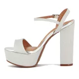 Sandalia de plataforma alta y taco grueso, color dorado brillante con textura glitter. Presenta una tira ancha en la parte delantera y una tira fina ajustable alrededor del tobillo.