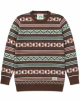 Buzo tejido de punto con diseño jacquard de motivos geométricos y nórdicos en tonos marrón, verde, blanco y azul. Presenta cuello redondo, puños y ruedo acanalados, y etiqueta de la marca Denali en el frente.