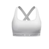 Top deportivo Under Armour de soporte medio, color negro, con diseño de espalda cruzada y banda elástica inferior con el logo de la marca estampado.