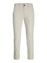 Pantalón chino slim de tiro medio en color beige, con cierre de cremallera y bolsillos laterales, confeccionado en tejido con algodón y elastano.
