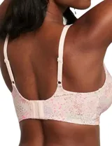 Bralette de lycra color rosa con estampado floral, sin aro y con copas internas removibles. Breteles fijos regulables y cierre trasero de tres posiciones.