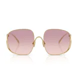 Lentes de sol Miu Miu modelo A57 con montura metálica dorada y cristales degradados en tonos rosados.