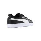 Championes Puma Smash v2 L de cuero blanco con detalles en negro, ideales para uso urbano.