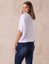 Buzo azul de tejido acanalado marca Ninety, con mangas cortas japonesas.