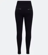 Pantalón legging negro de viscosa con elastano, corte cigarrillo, con cierre y detalles en material sintético.