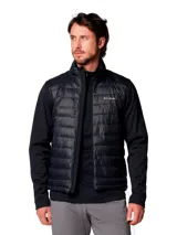 Chaqueta híbrida Columbia con panel frontal acolchado y mangas de tejido softshell liso. Cuenta con cierre frontal completo, cuello alto y tecnología Omni-Shield para repelencia a la humedad y manchas.