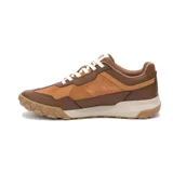 Championes Caterpillar modelo Hex Ready T-Toe para hombre, en tonos marrón, tostado y beige, con cordones blancos. Combinan cuero, gamuza y paneles textiles, con suela robusta y el logo de la marca en el lateral.