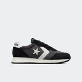 Championes Converse Run Star Trainer, color gris con detalles en negro y blanco. Inspirados en los championes de running de los años 80, ofrecen comodidad y ligereza.