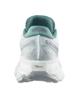 Championes de running Salomon Aero Glide 4, color negro con suela blanca alta y amortiguada. Presenta capellada de malla transpirable sin costuras y el nombre de la marca impreso en el lateral.