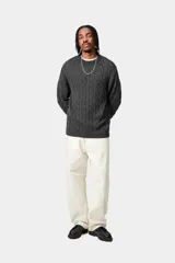 Sweater de punto con diseño de ochos, cuello redondo, mangas largas y corte holgado.
