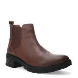 Botas tipo Chelsea de cuero color marrón, con paneles elásticos laterales y suela dentada de goma con tacón bajo.