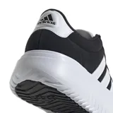 Championes Adidas Grand Court con diseño de plataforma, confeccionados en material sintético negro con las icónicas tres tiras laterales en blanco. Presentan suela de plataforma dentada y cierre con cordones.